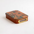 The Art of Marbling Matches in Tin